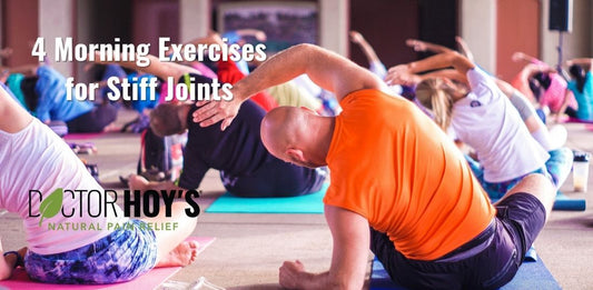 Group yoga class doing a seated side stretch